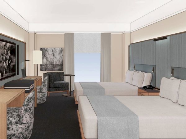 The image shows a modern hotel room with two beds, a TV, a desk, and a chair, featuring a neutral color palette and minimalistic design.