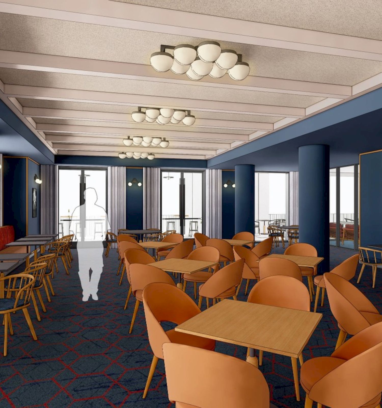 The image shows a modern dining area with orange chairs, blue walls, and framed photos. Round lights hang from the ceiling.